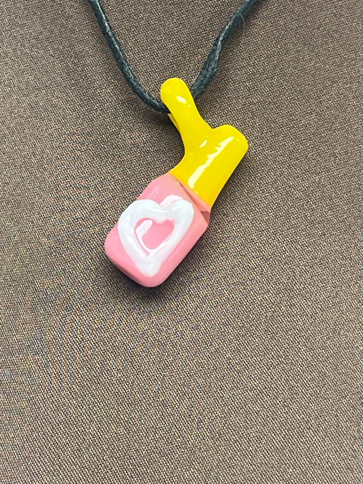 Nail polish pendant